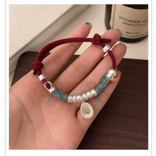 Small Niche Design of Chinese Style Hand Rope Woven Into a Silver Bracelet